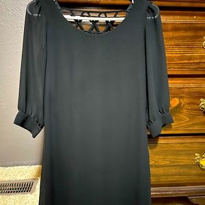 Black knee length dress cross cross back